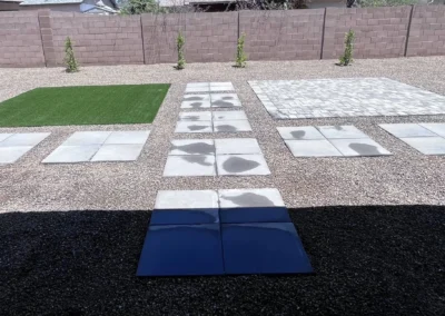 back yard pavers, new turf, shrubs and granite gravel